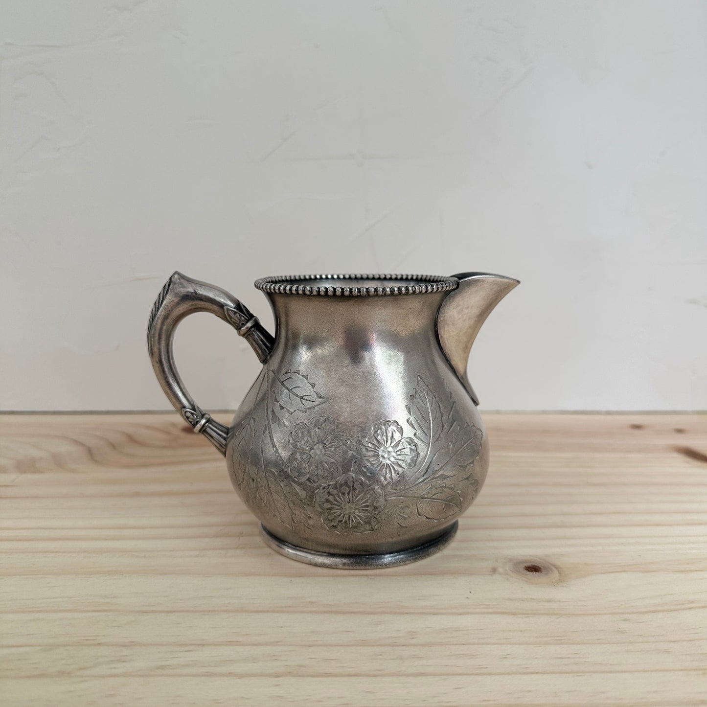 Silver Pitcher With Etched Flowers