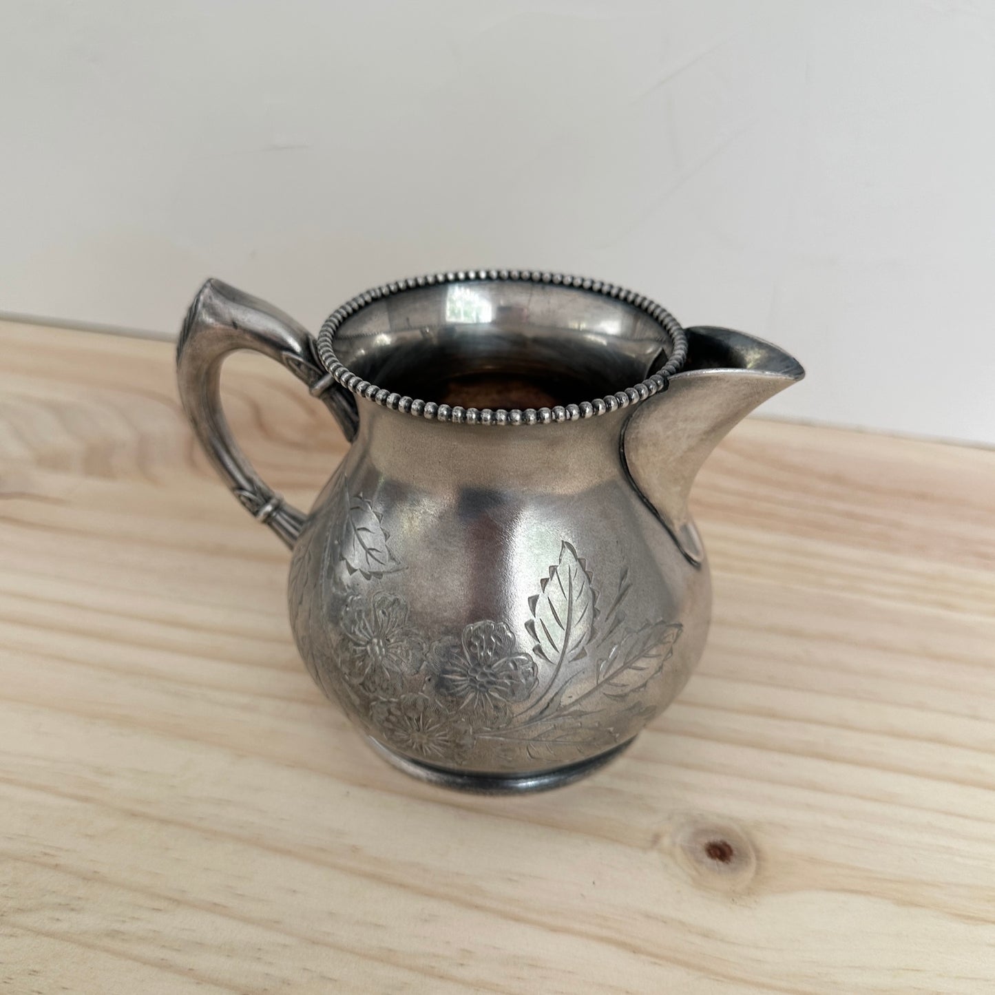 Silver Pitcher With Etched Flowers