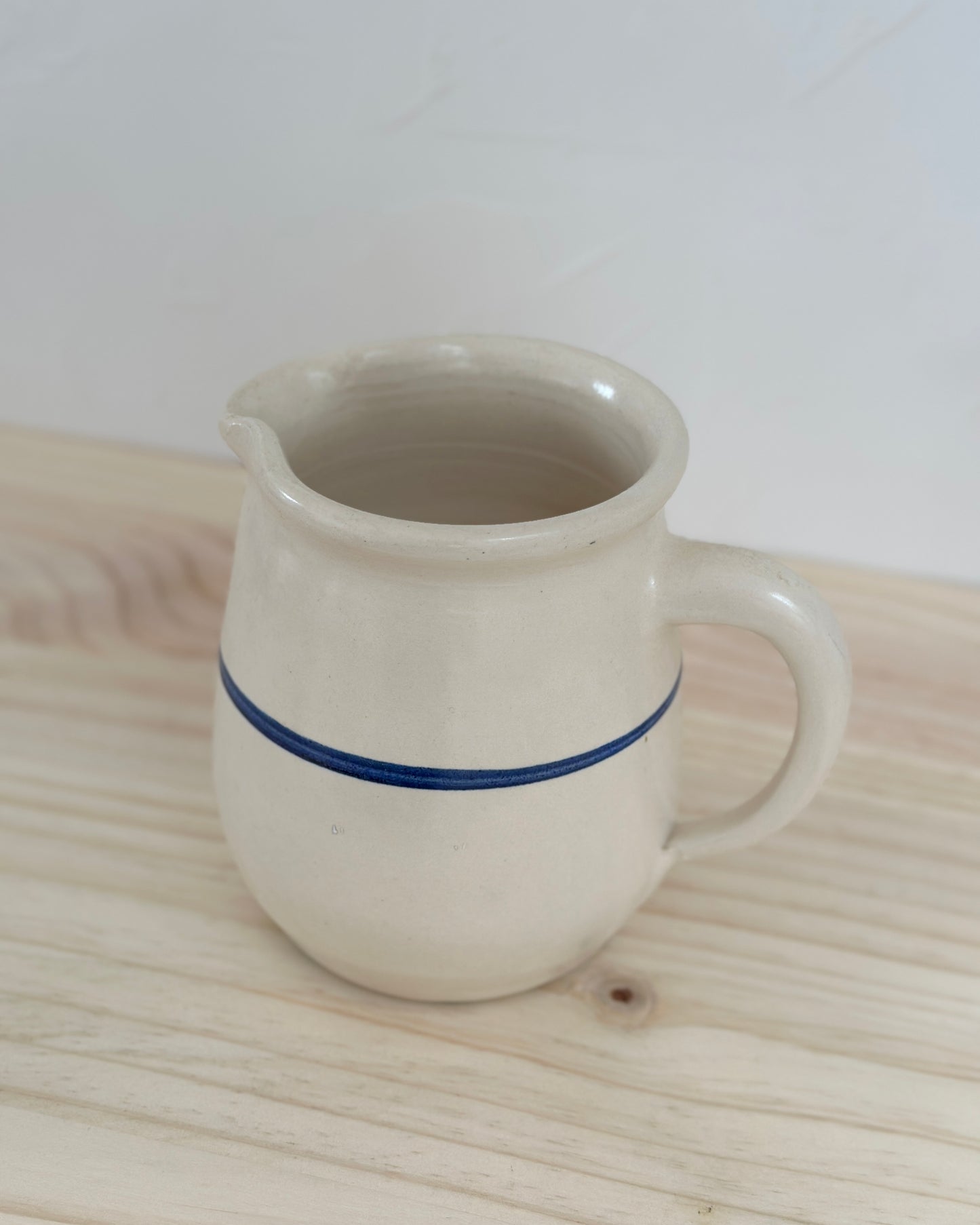White Pitcher With Blue Stripe