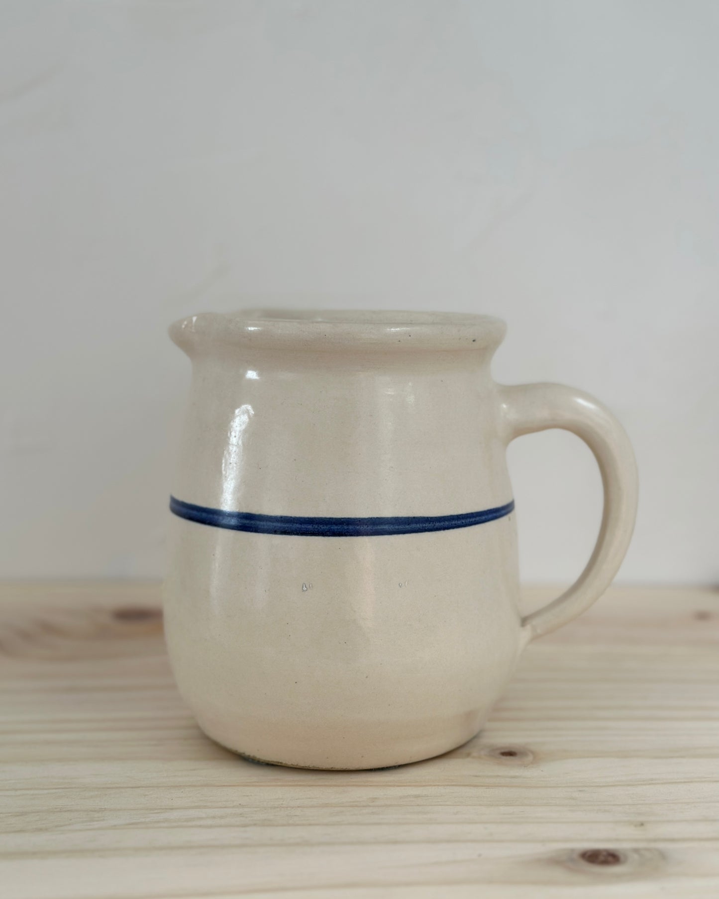 White Pitcher With Blue Stripe